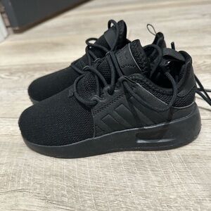 Black Adidas sneakers